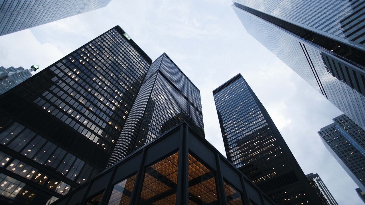 Looking up at city skyscrapers