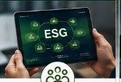 Hands holding tablet showing ESG dashboard